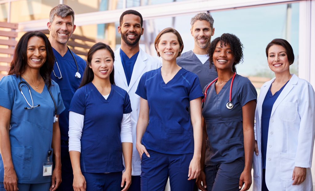 Group shot of doctors and nurses represent GPRO, a Group Practice Reporting Option.